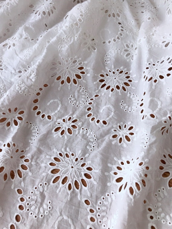 Cotton Eyelet Fabric Delicate flower fabric in Off-White Eyelet