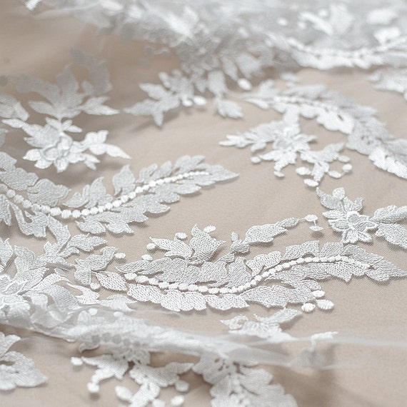 Tissu en élégant dentelle brodée blanche robe de mariée en Tissu dentelle florale douce tissu d77a1f Tissu en élégant dentelle brodée blanche robe de mariée en Tissu dentelle florale douce tissu d77a1f