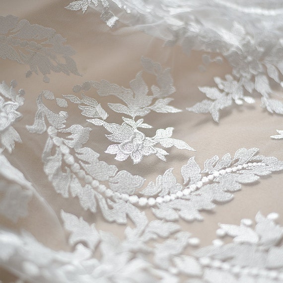 Tissu en élégant dentelle brodée blanche robe de mariée en Tissu dentelle florale douce tissu d77a1f Tissu en élégant dentelle brodée blanche robe de mariée en Tissu dentelle florale douce tissu d77a1f