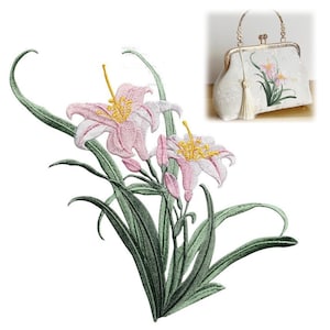 May include: Embroidered patch featuring pink lily flowers with yellow stamens and green leaves. A white handbag with a matching lily design and gold-colored handle is also shown.