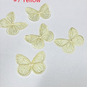 May include: Five yellow lace butterfly appliques. #7 Yellow.