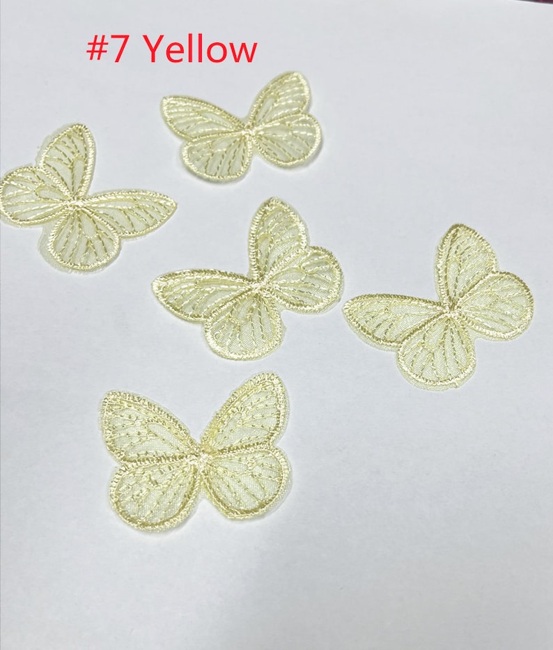 May include: Five yellow lace butterfly appliques. #7 Yellow.