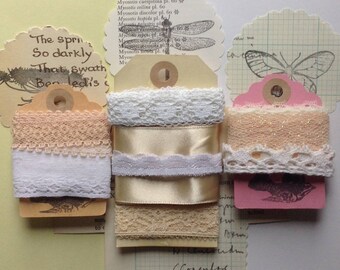 5 metres (5.5 yards) of pinks, creams and whites vintage lace