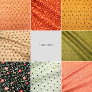 May include: A collection of nine fabric swatches featuring various floral and paisley patterns in a variety of colours, including orange, red, yellow, green, black, and white. The swatches are arranged in a grid pattern with the text "moda fabrics - supplies" in the centre.