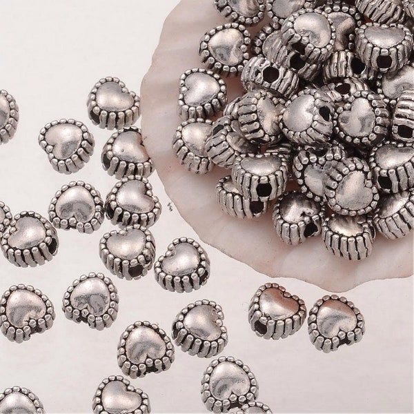 Perles intercalaires coeur mètal argenté 5,5x5,5mm trou 1,5mm