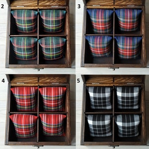 May include: A wooden box with four compartments, each lined with a different plaid fabric. The box is open and the compartments are empty.