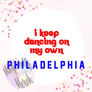 May include: A white circle with a pink background and pink stars. The text "i keep dancing on my own" is in red. The text "PHILLY MADE MERCH" is in blue.