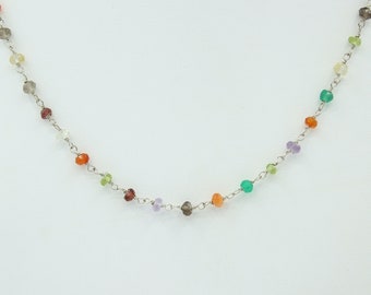 necklace with a chain and multicolored pearls