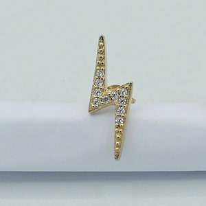 Puce d'oreille Eclair pavée de zircon. Existe en 2 couleurs. Vendue à l'unité