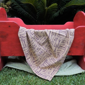 Hand made baby blanket with tool motif.