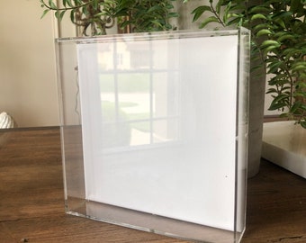 8x8x1.5 clear shadow frame with a black pvc backing