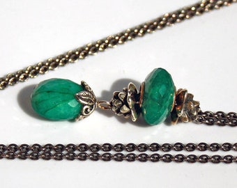 Fantasy-Necklace with a faceted Emerald