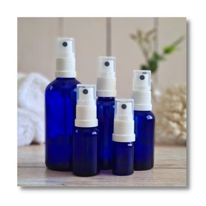 Elegant Blue Glass Spray Bottles with Premium Quality White Sprayer: 15ml – 100ml. Beauty, Skincare, Aromatherapy, Perfumes and Gifting.