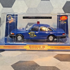 Code 3 Politiewagen Ford Crown Victoria 1/24 Michigan State Patrol met patch NIB