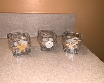 Set strandtheelichthouders, decor van geconserveerde zeedieren