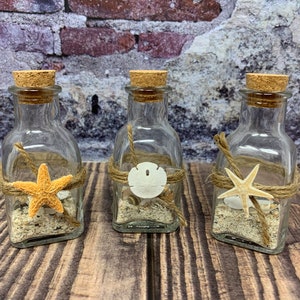 Home decor, beach decor, beach jars, beach bottles bottles, starfish bottles, bathroom decor, sand bottles, glass jar, wedding favors,