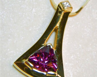 Umbalite Garnet and diamond pendant set in 18k yellow gold
