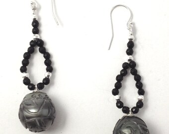 Tahitian carved pearl and black onyx earrings