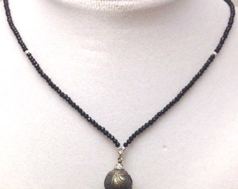 South sea Tahitian carved pearl necklace 18kw gold  and black spinel beads