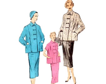 May include: Three women wearing matching outfits with different colored jackets. The woman on the left is wearing a blue jacket and skirt, the woman in the middle is wearing a pink jacket and skirt, and the woman on the right is wearing a white and gray jacket and a black skirt.