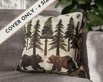 May include: A square throw pillow cover featuring a quilted design of two brown bears walking through a forest of tall pine trees. The cream-colored background has stitched patterns, and the text COVER ONLY - 4 SIZES is printed diagonally.