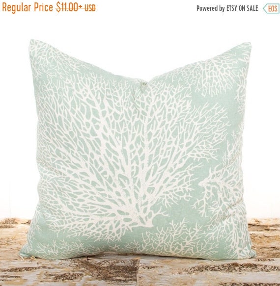 green and coral pillows
