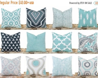 teal print throw pillows