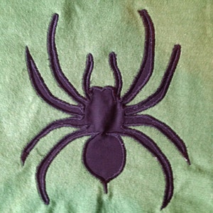 Tarantula (Spider) Machine Appliqué Design in two different sizes.  Create some edgy home decor and stitch out a bug!