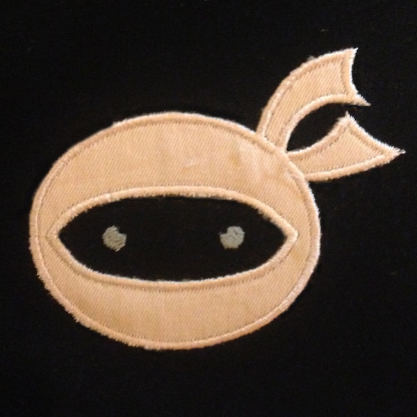 Simple and cute mysterious little ninja face machine applique design and embroidery design in several sizes