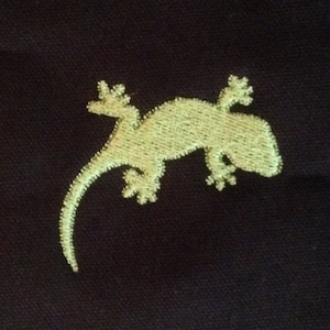 Simple gecko or little lizard machine applique and embroidery designs in several sizes and styles