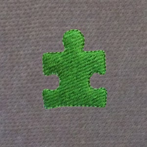 Puzzle Piece Machine Embroidery Design for Autism Awareness in 2 sizes. Simple, Elegant and Bold Puzzle Piece Machine Embroidery Design
