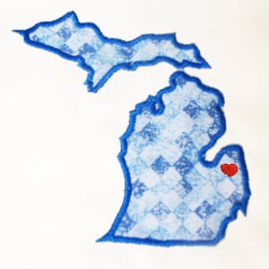 Michigan appliqué and embroidery design in 7 styles and sizes.  Buy this U.S. state (Michigan) embroidery design set -  get any state free