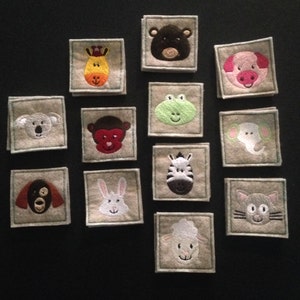 Darling in-the-hoop memory (or matching) game to make with your embroidery machine. Includes 12 different pairs of animal faces.