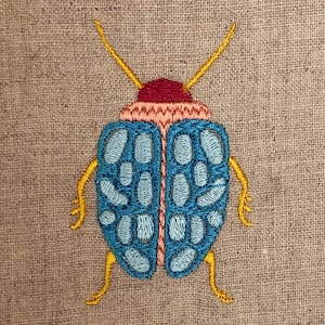 Fun and colorful beetle DIGITAL machine embroidery design. Stitch this bug on clothes and accessories using your embroidery machine.
