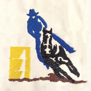 Cowboy on horse barrel racing machine embroidery design.