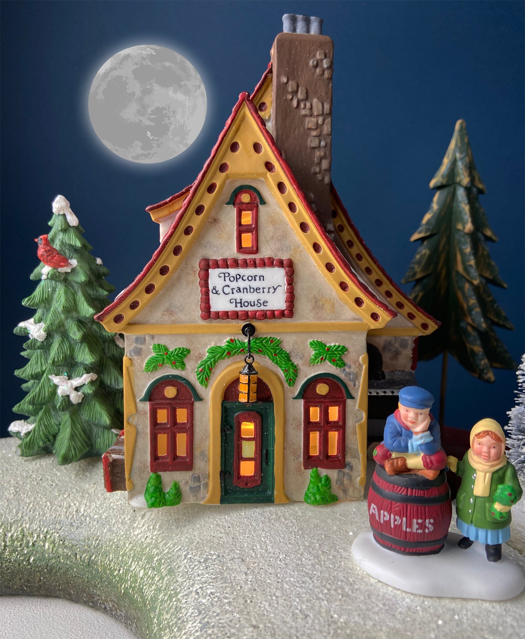 Popcorn and Cranberry House. Illuminated Porcelain Christmas