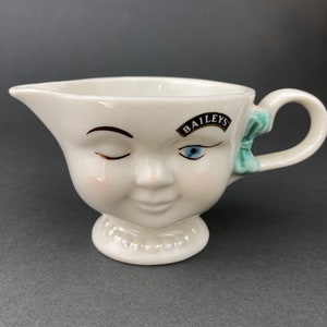Bailey&#39;s Winking Face Creamer with Blue Bow.  Yum Collectible Creamer.  Limited Edition.