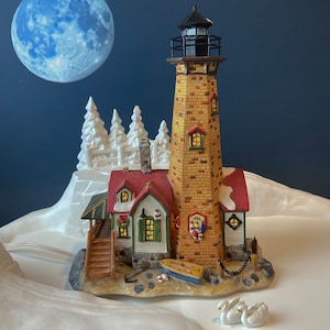 Illuminated Pelican Pointe Lighthouse. Christmas Village House. Santa&#39;s Workbench Collection. Home or Retail Holiday Display. Alt. Christmas