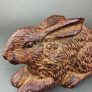 Bunny Rabbit Figurine. Chocolate Bunny with Flower Wreath. Easter and Spring Celebration.