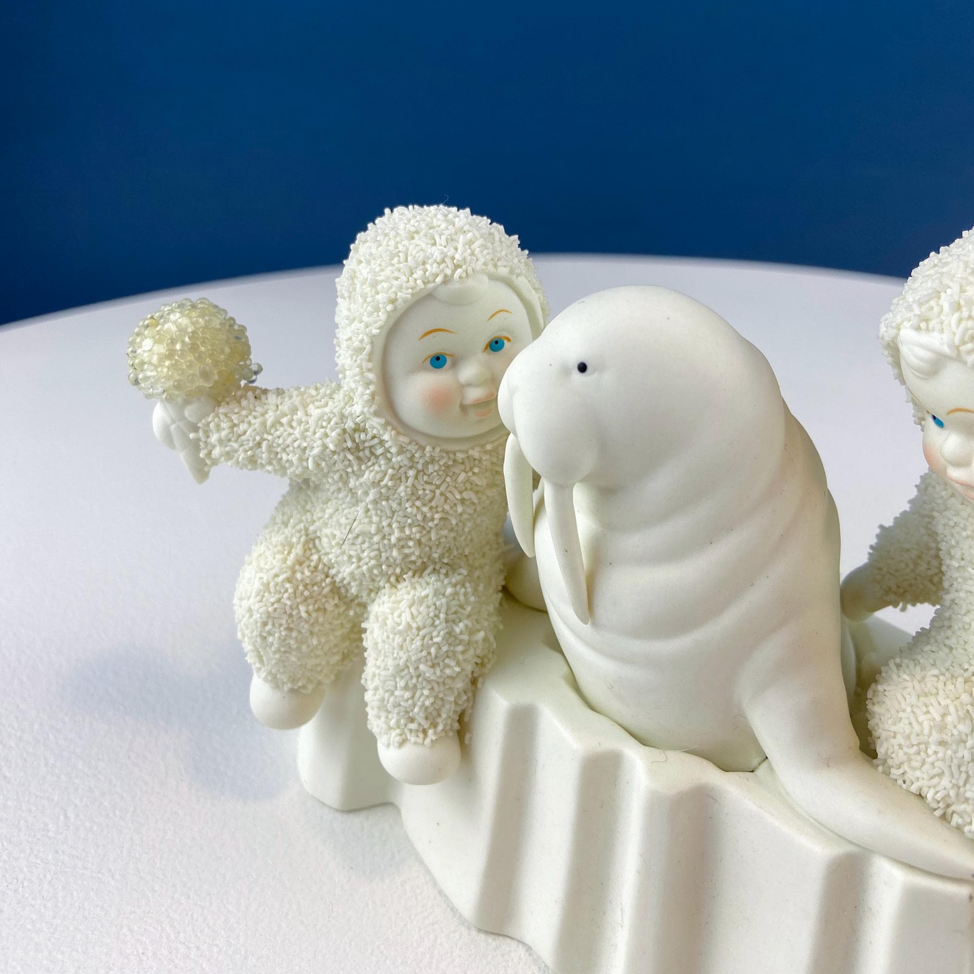 Snowbabies Playing With Walrus. 