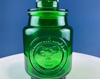 ヴィンテージのグリーンガラス製保存瓶（蓋付き）。ニュージャージー州