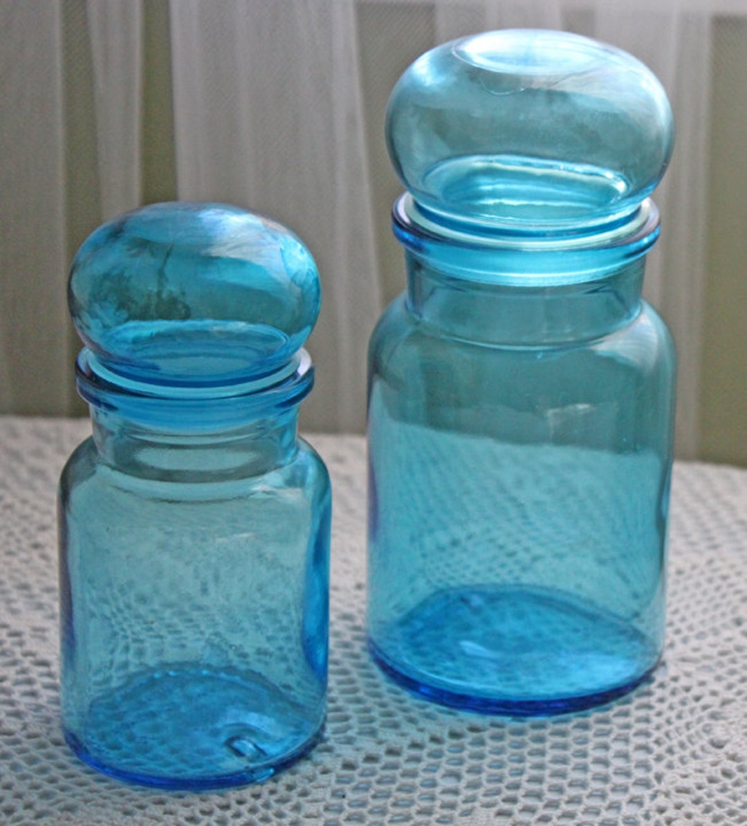 Blue Glass Jars With Bubble Lids. Simple Design Containers in Beautiful Blue Color. Set of Two