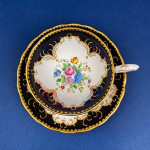 Vintage Teacup with Saucer by Tuscan. Black White Gold with Floral Pattern. Cup Made in England.