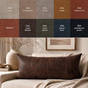 May include: A dark brown rectangular cushion with vertical stitched detailing is placed on a beige sofa. The image also shows a colour palette of fabric swatches labelled "ZEN" in various colours: ivory, stone beige, stone, camel, terracotta, Monica, dark brown, olive green, smoky blue, and anthracite black.