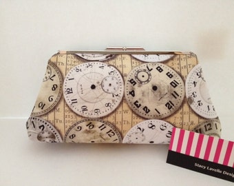 Timepiece Print Clutch Purse with Gold tone Finish Snap Close Frame