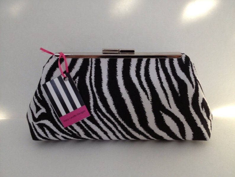 black and white zebra print clutch bag