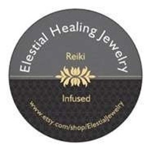 May include: A grey and black circle with the text "Elestial Healing Jewelry" in white. The text "Reiki Infused" is also in white. A stylised floral design is in the centre of the circle.