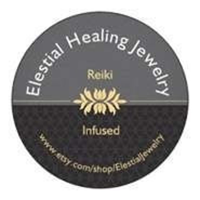 May include: A grey and black circle with the text "Elestial Healing Jewelry" in white. The text "Reiki Infused" is also in white. A stylised floral design is in the centre of the circle.
