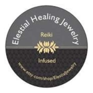 May include: A round, two-toned sticker with the text "Elestial Healing Jewelry" in white, arched around the top. The bottom half features the text "Infused" and "www.etsy.com/shop/ElestialJewelry". A gold floral design is in the center.