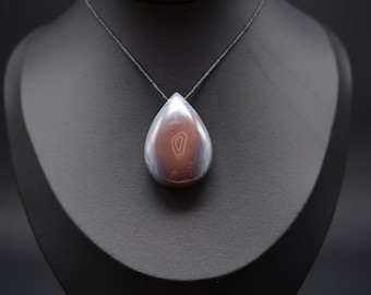 A  Hand Carved  African Agate Pendant - AHP-004